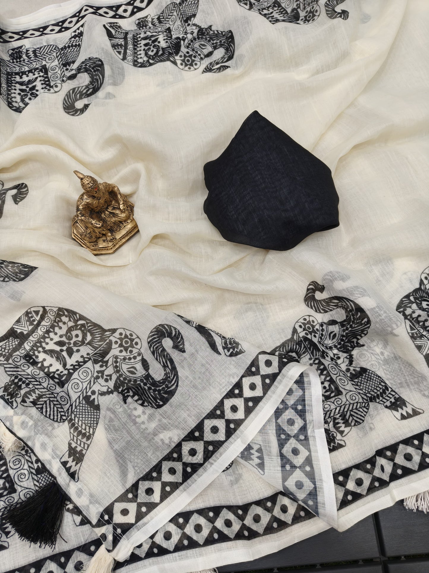 Handloom Linen Cotton Saree with Black Elephant Print & Tassel Border