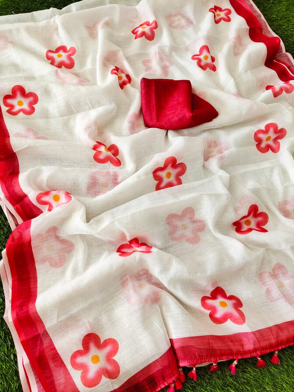 Trendy White & Pink Linen Saree with Floral Prints