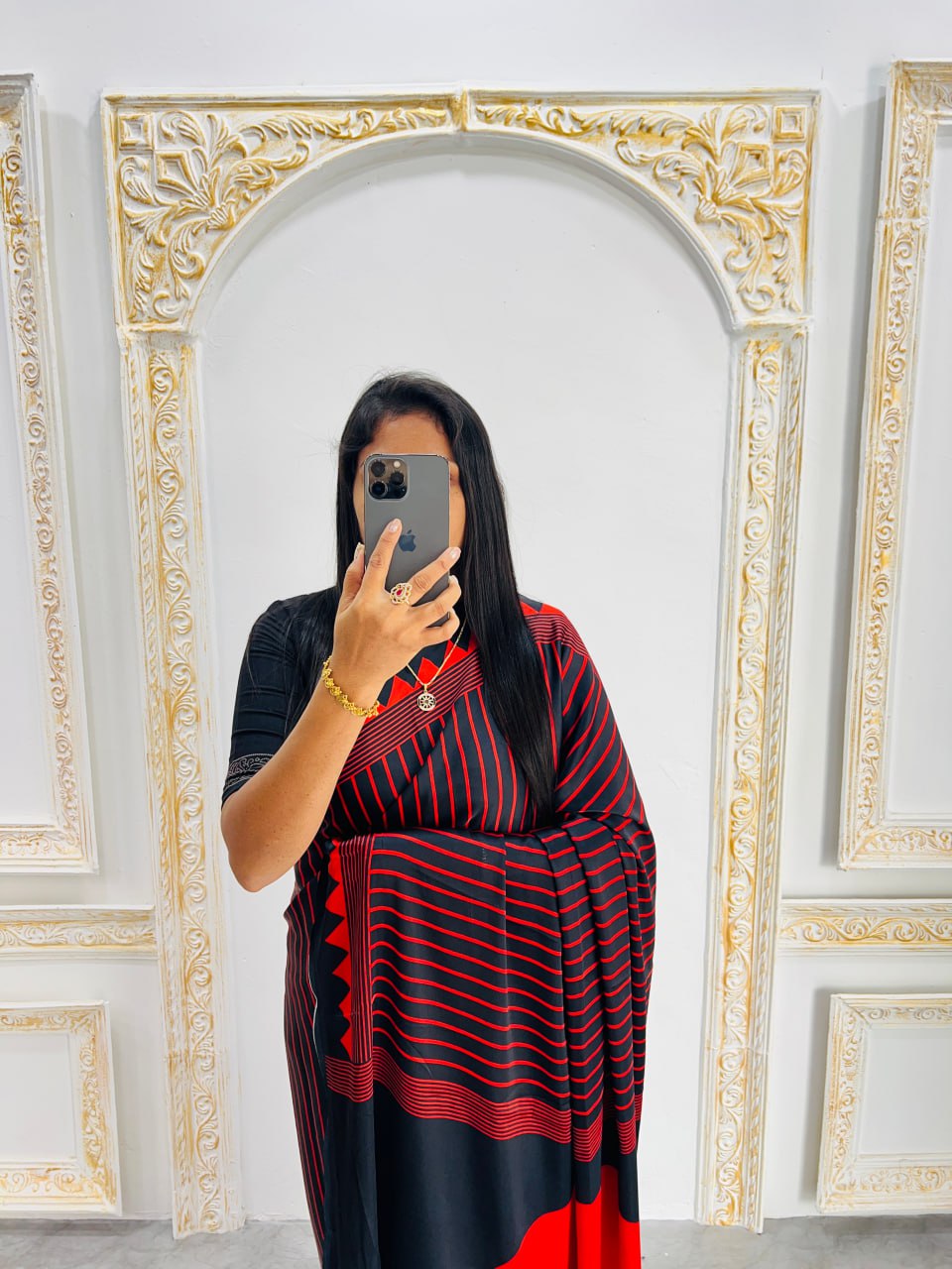 Black & Maroon Saree with Bold Red Circle Pallu – Modern Designer Look