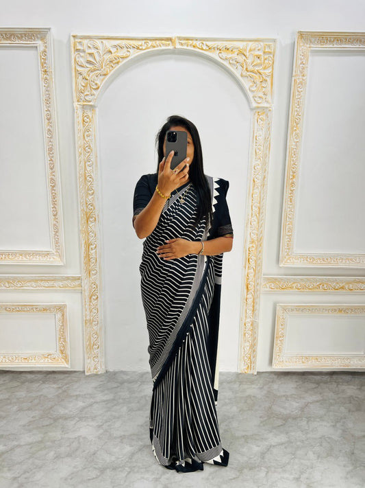 Black & White Saree with Bold White Circle Pallu – Modern Designer Look