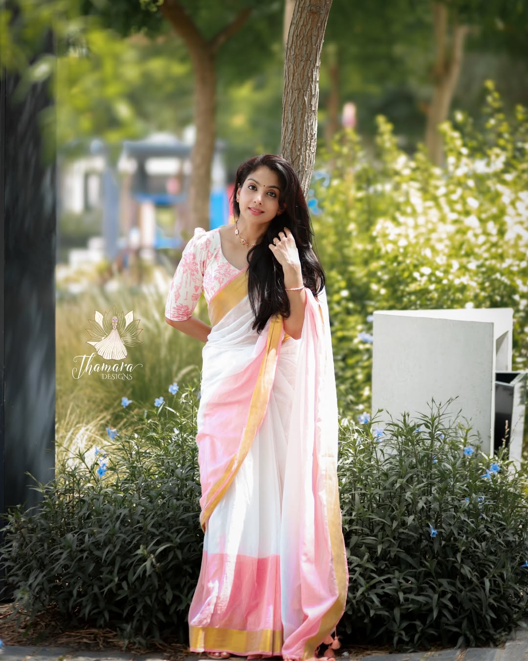 Classic White Linen Saree with Pink Border and Golden Zari Accent